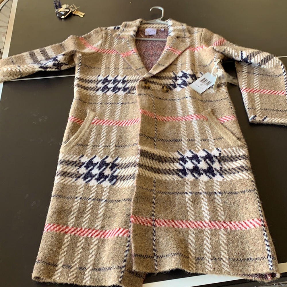 Women’s full length cardigan. Brand new